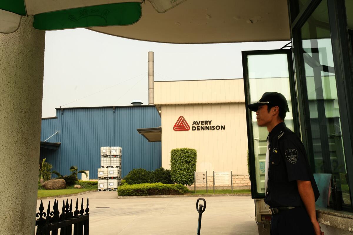 Avery Dennison has agreed to sell two units to Canada's CCL Industries Inc. for $500 million. Above, a file photo of an Avery plant in China.