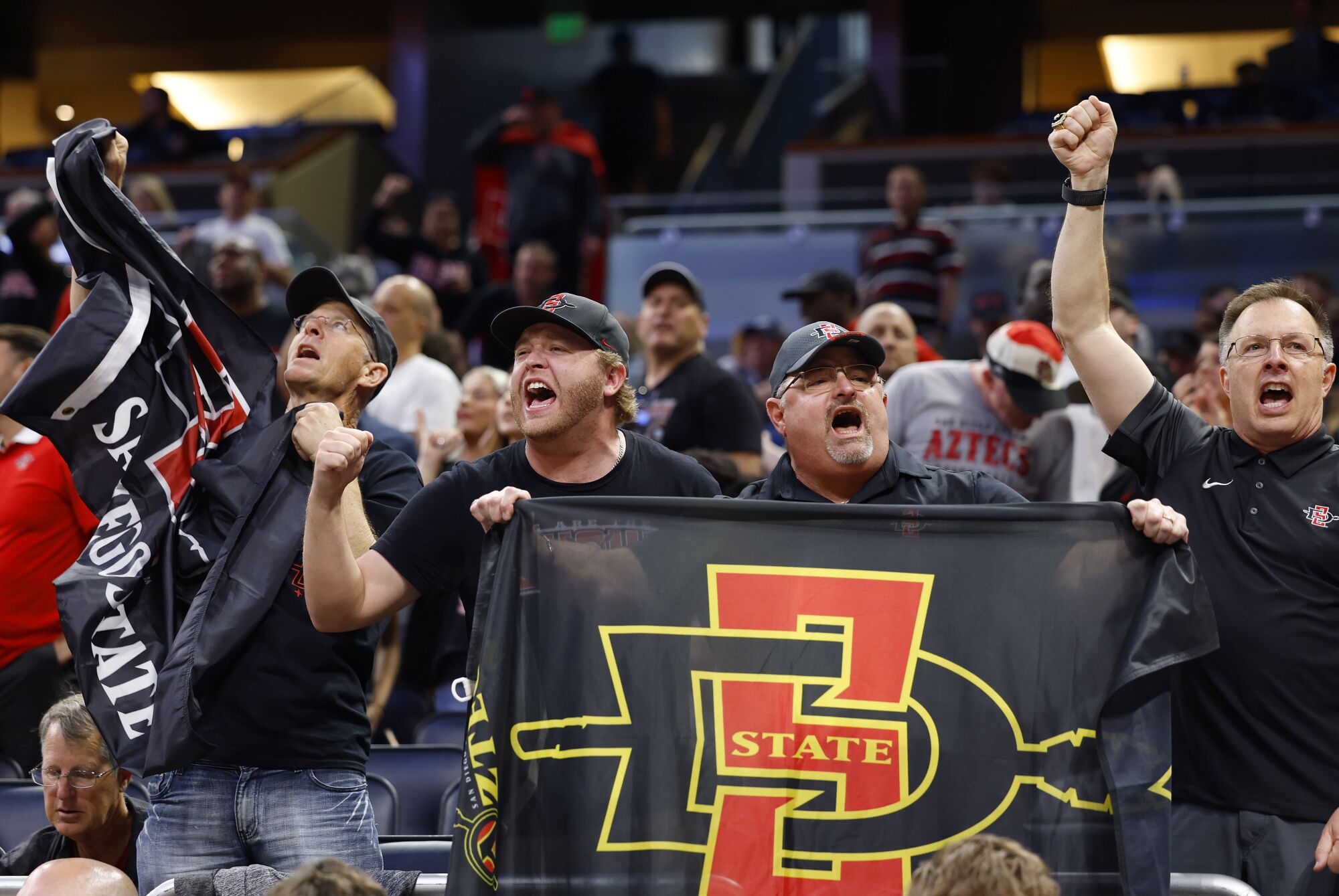 San Diego State fans celebrate after beating the College of Charleston.