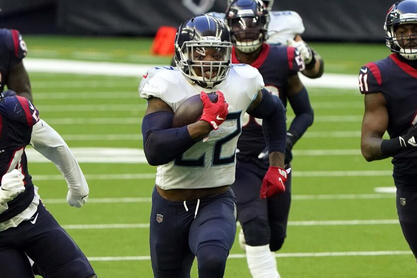 Tennessee Titans running back Derrick Henry (22) runs for a touchdown as Houston Texans.