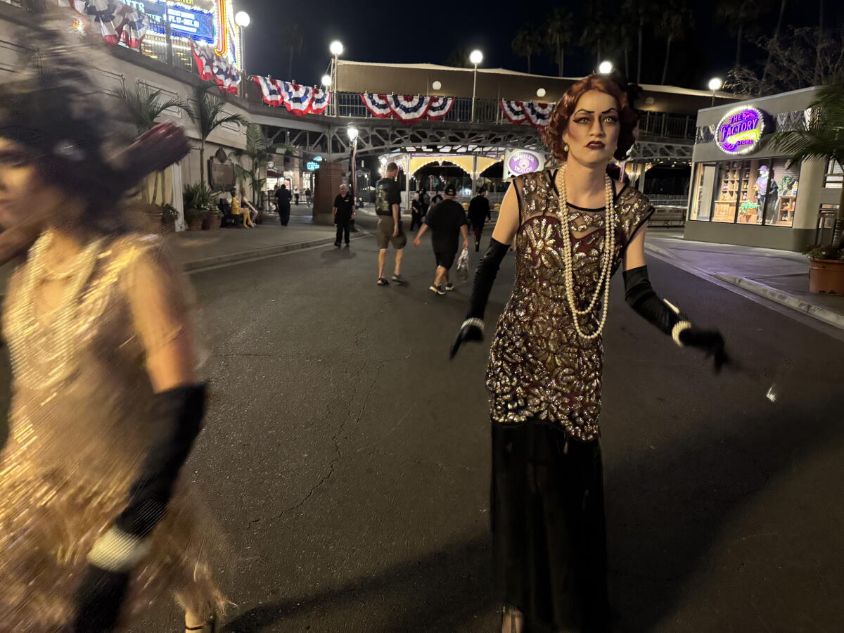 Actors work the "Gore-ing '20s scare zone during the Nightmares Revealed preview of this year's Knott's Scary Farm.