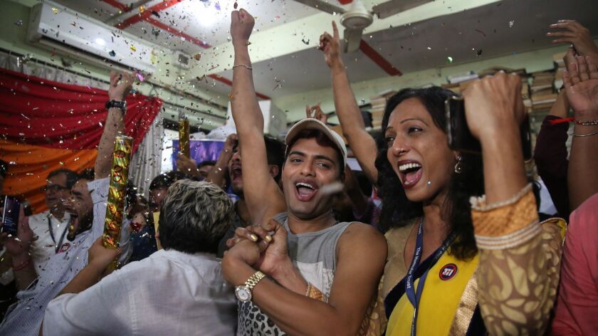 Indians celebrate in Mumbai after the country's top court overturned a colonial-era law that makes homosexual acts punishable by up to 10 years in prison.