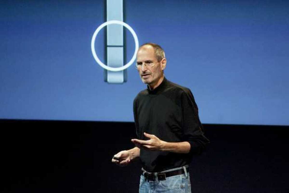 The late Steve Jobs, then Apple's chief executive, addresses iPhone 4 reception problems at a July 2010 news conference.