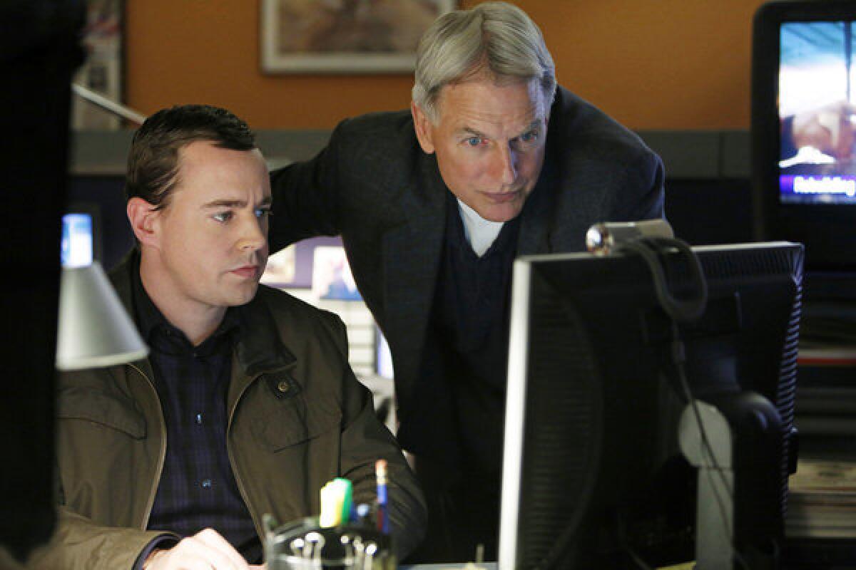 CBS owns a stable of lucrative shows, including "NCIS." Pictured Sean Murray, left, and Mark Harmon in a scene from "NCIS."
