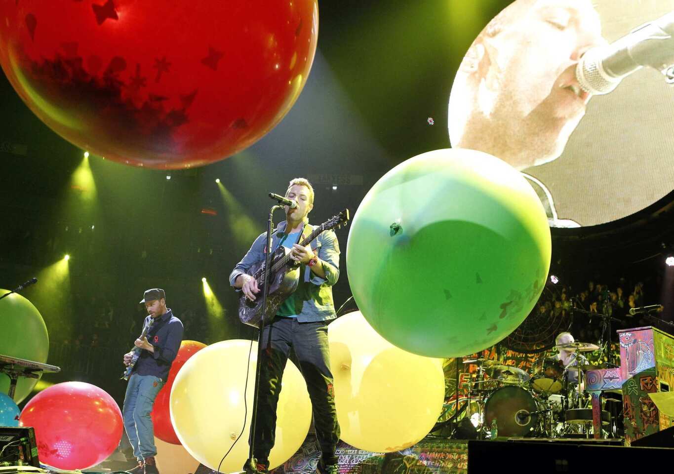Coldplay's fifth album, "Mylo Xyloto," sees the band once again placing moderately pleasant orchestral rock arrangements around lyrics fit for Hallmark cards, writes Times critic Randall Roberts.
