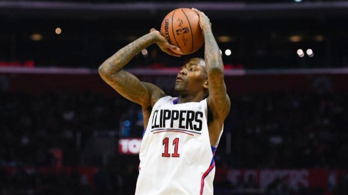 Clippers guard Jamal Crawford (11) shoots against the Rockets during the first half on Mar. 1.