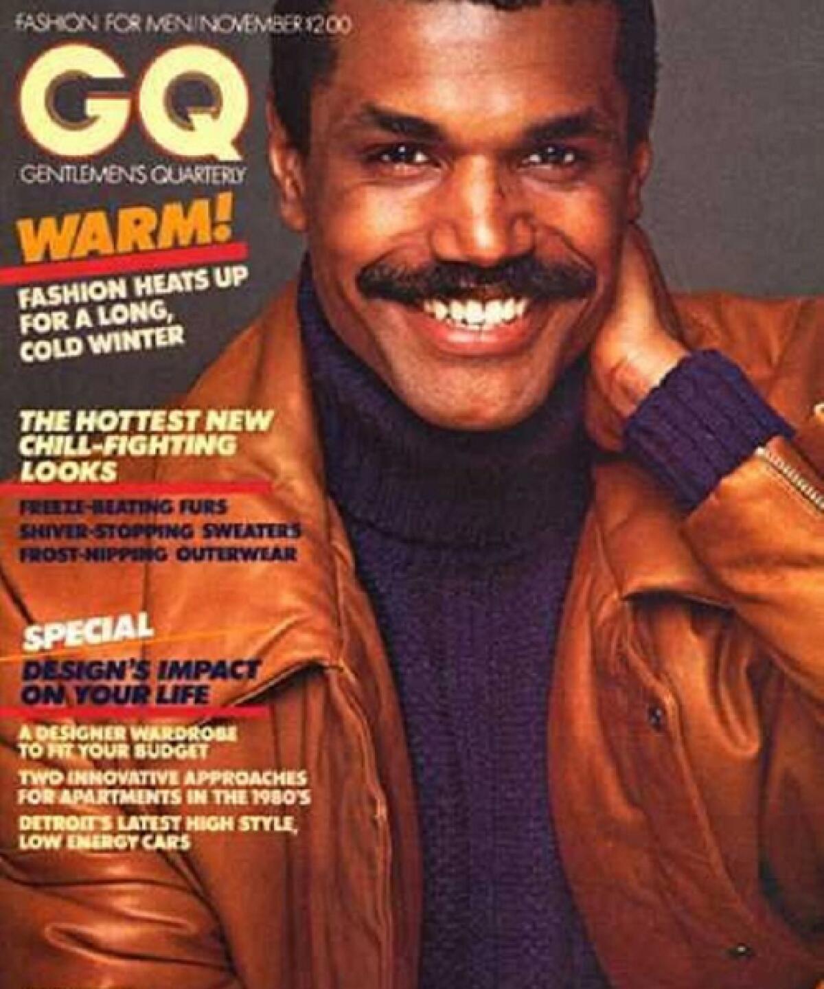 A GQ magazine cover featuring model Renauld White wearing a brown leather jacket and deep-purple turtleneck sweater