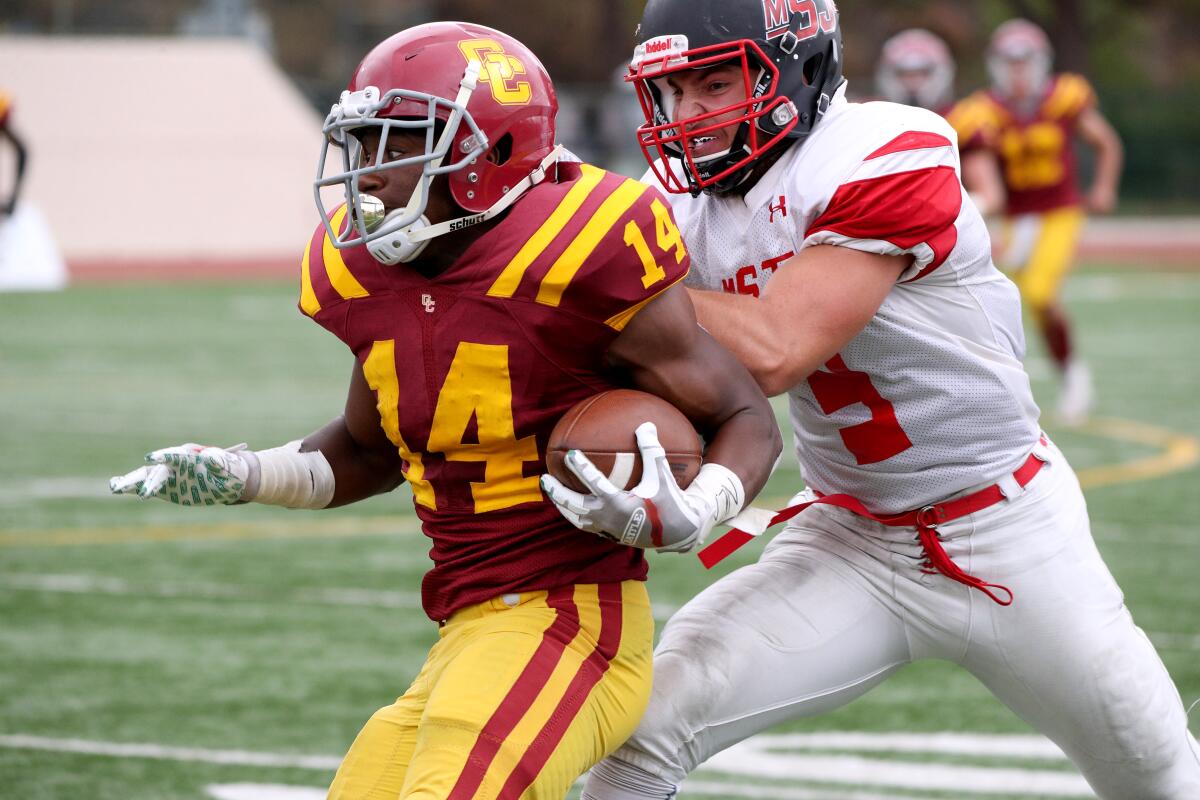 Glendale Community College RB Tre Fugate gets caught from behind in home game vs. Mt. San Jacinto College, at Sartoris Field in Glendale on Saturday, Sept. 28, 2019.
