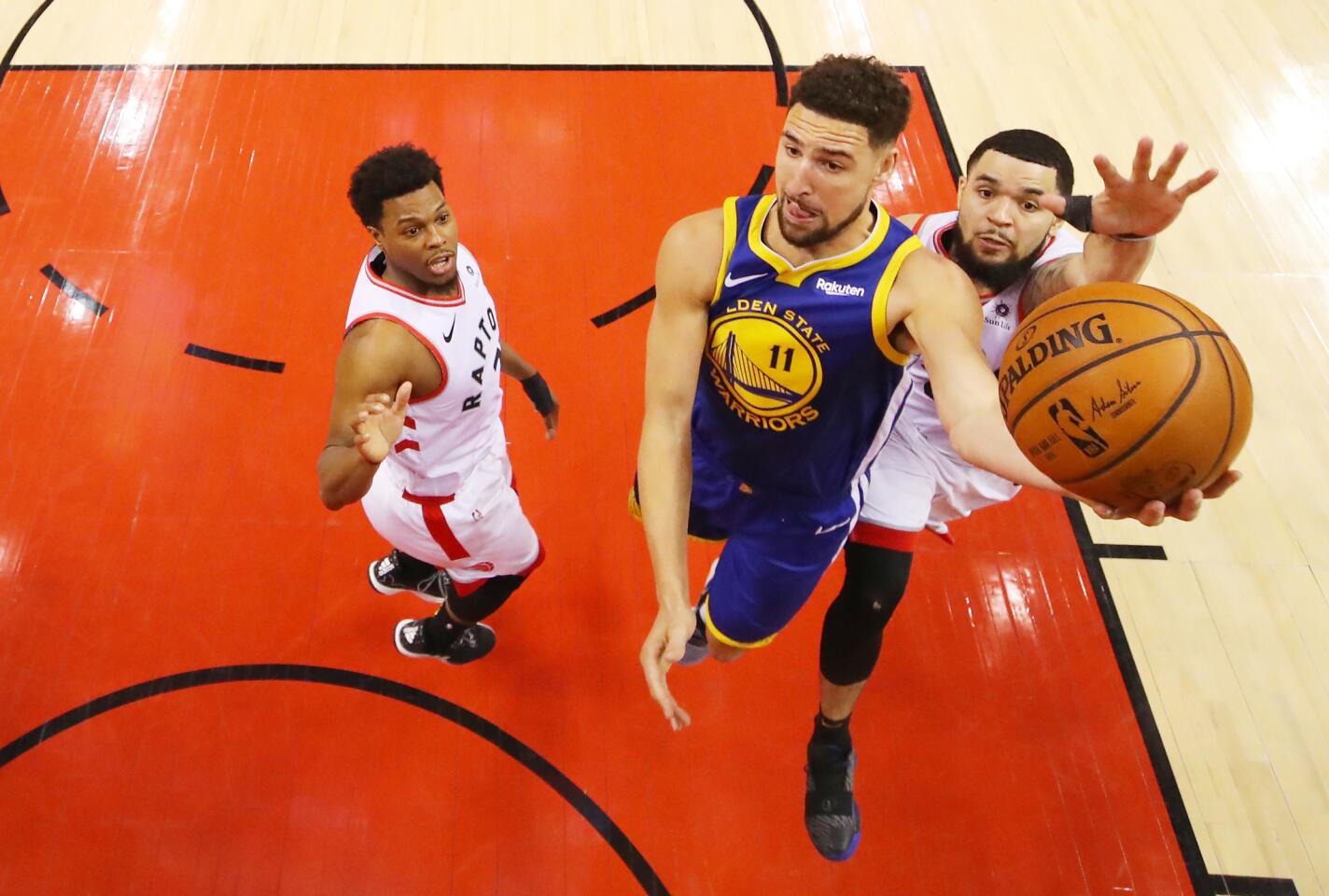 TORONTO, ONTARIO - JUNE 02: Klay Thompson #11 of the Golden State Warriors attempts a shot against Fred VanVleet #23 of the Toronto Raptors during Game Two of the 2019 NBA Finals at Scotiabank Arena on June 02, 2019 in Toronto, Canada. NOTE TO USER: User expressly acknowledges and agrees that, by downloading and or using this photograph, User is consenting to the terms and conditions of the Getty Images License Agreement. (Photo by Kyle Terada - Pool/Getty Images) ** OUTS - ELSENT, FPG, CM - OUTS * NM, PH, VA if sourced by CT, LA or MoD **