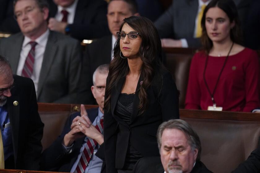 Rep. Lauren Boebert, R-Colo., votes present during the 14th vote in the House chamber as the House meets for the fourth day to elect a speaker and convene the 118th Congress in Washington, Friday, Jan. 6, 2023. (AP Photo/Alex Brandon)