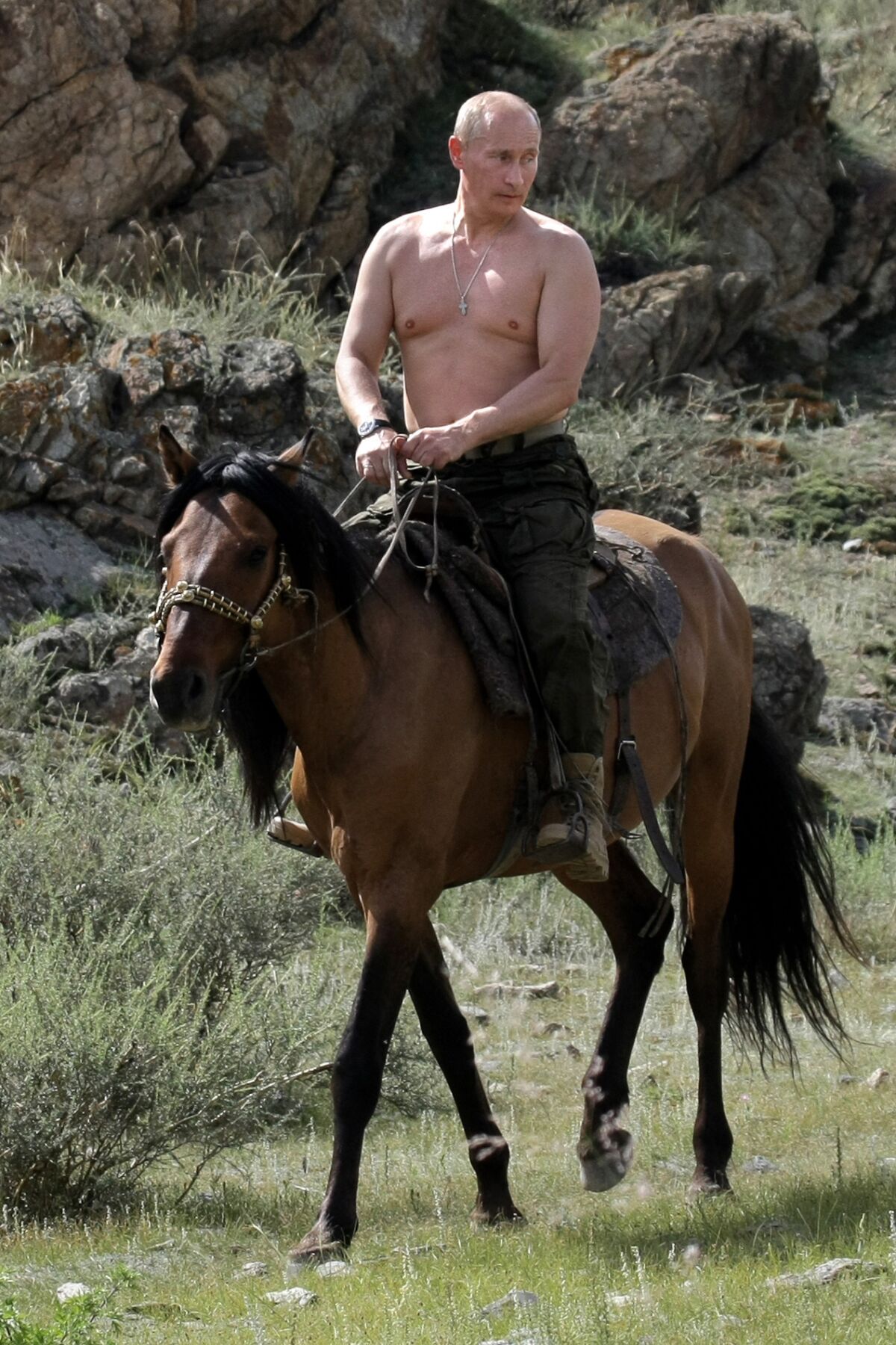 Russian Prime Minister Vladimir Putin rides a horse during his vacation outside the town of Kyzyl in the southern Siberia on Aug. 3, 2009.