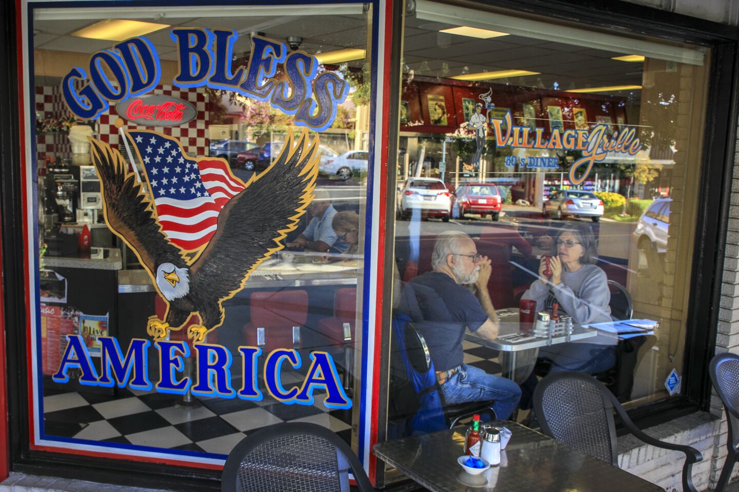 A very patriotic message greets the customers at the Village Grill , a '50s diner in Claremont Village.