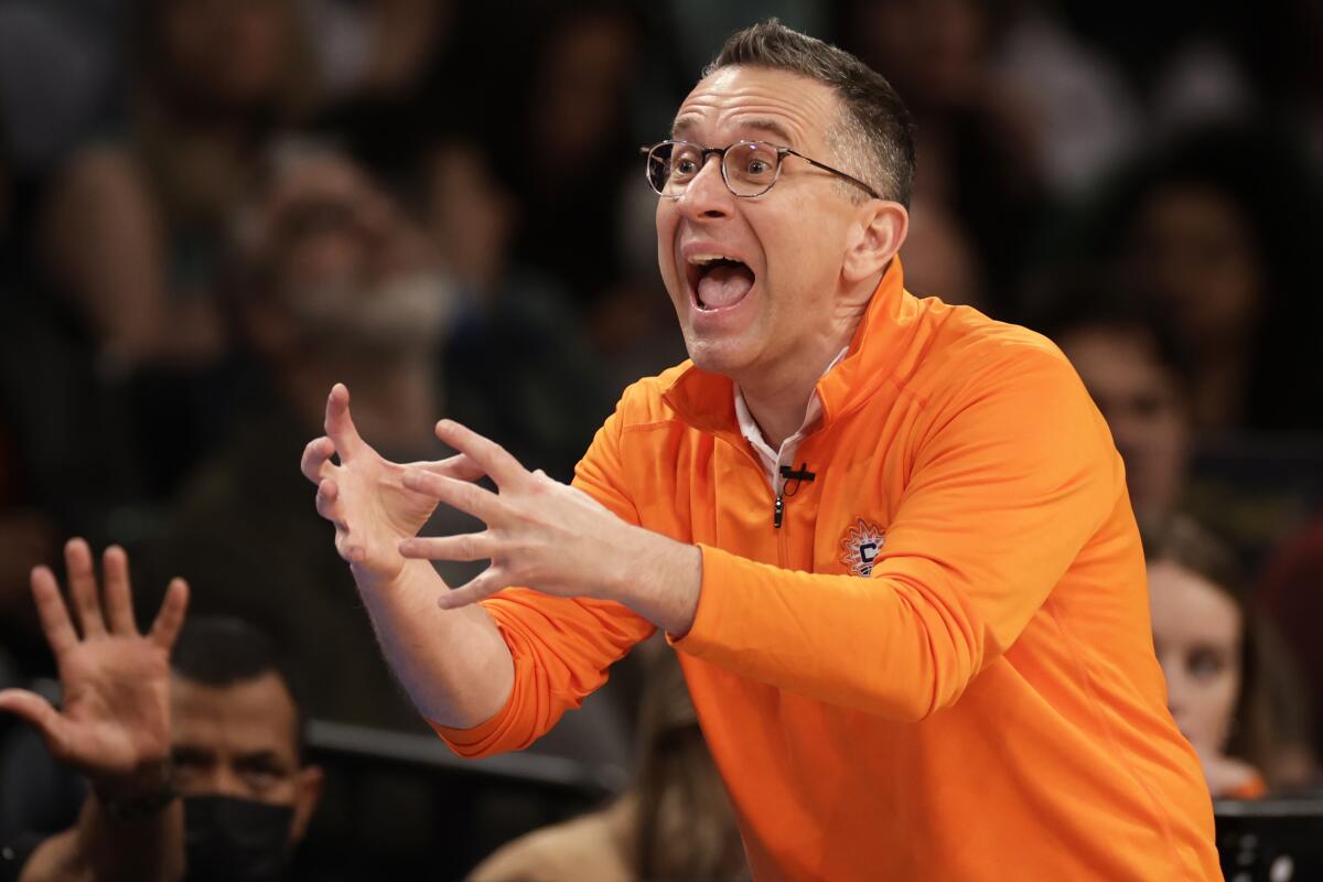 Curt Miller reacts to a call during a game as Connecticut coach last season.