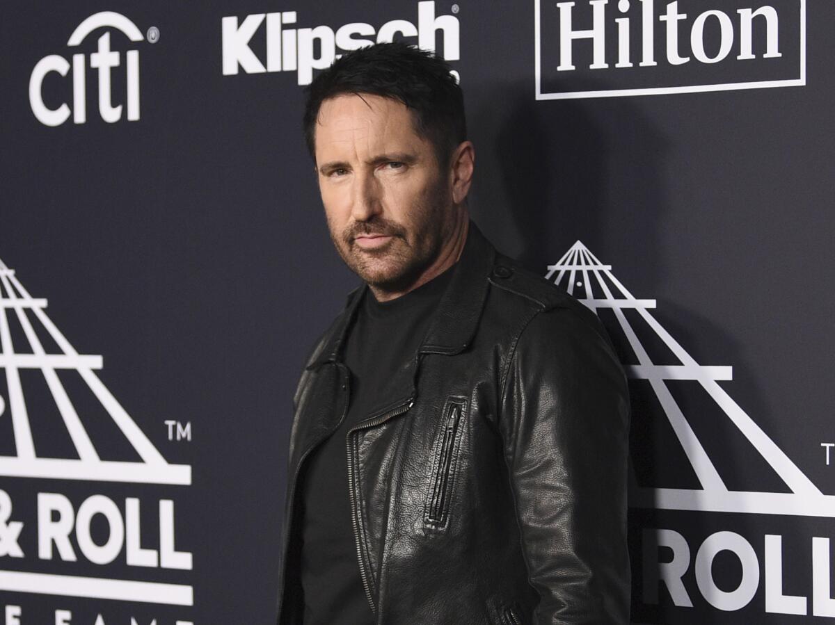 Trent Reznor in black leather jacket