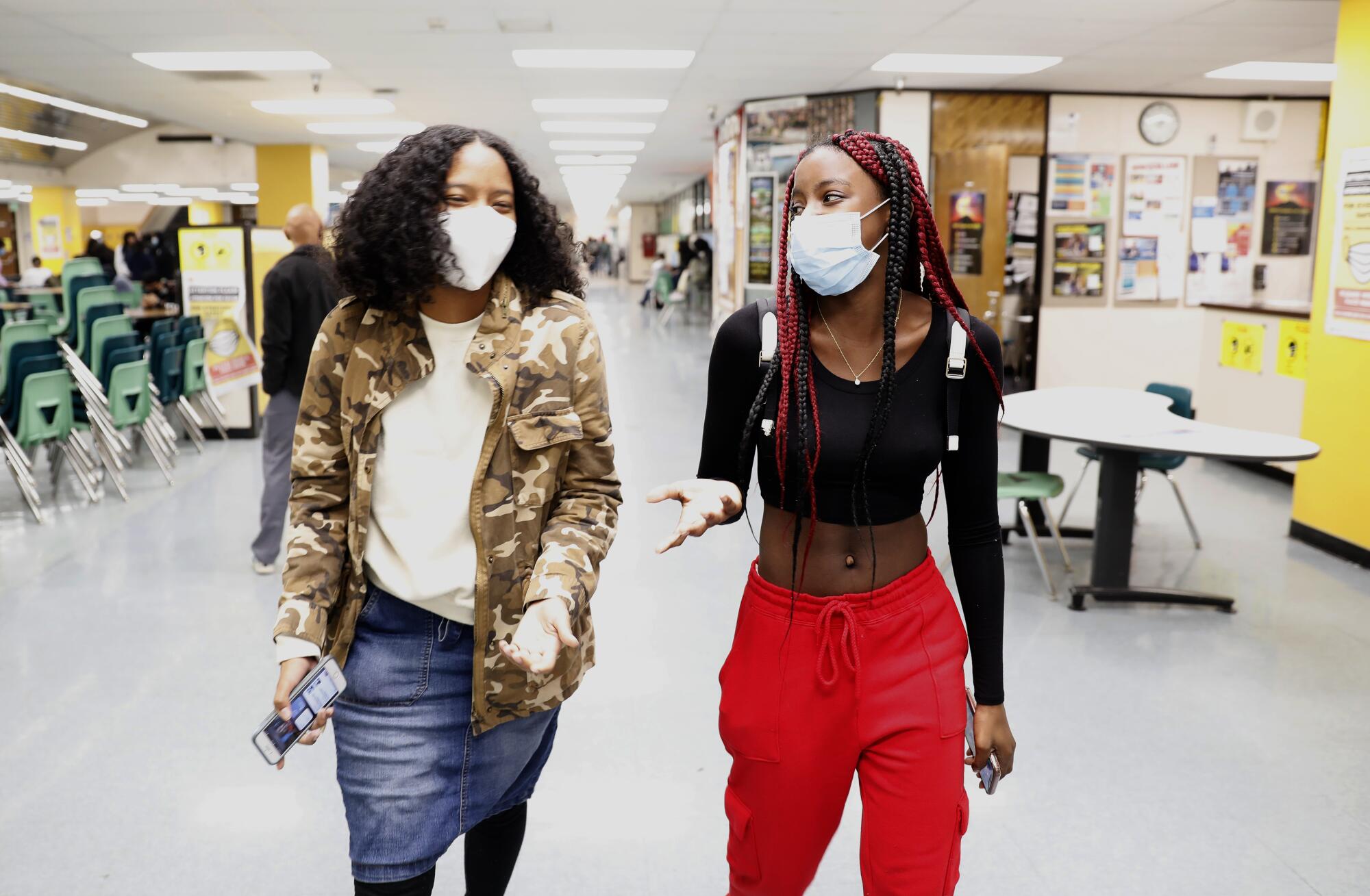 Aleyia Willis, 17, right, and Kaila London, 17, at Downtown Magnets High School.