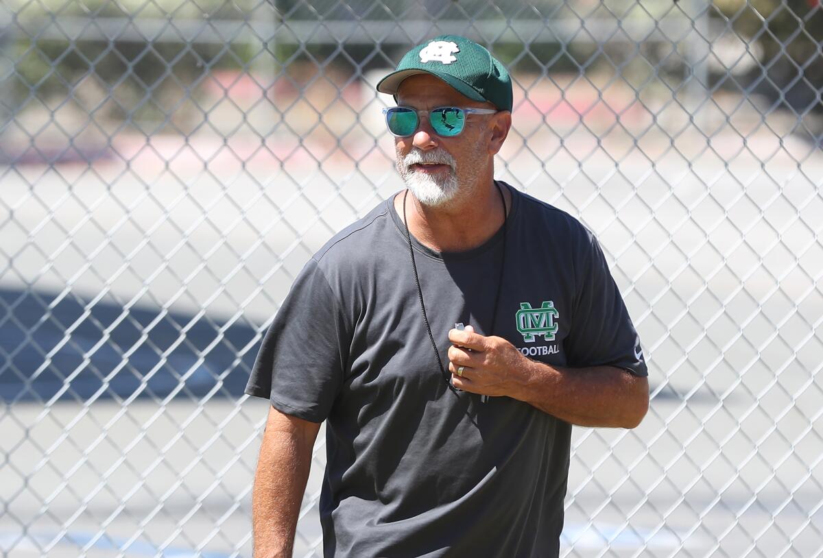Former Costa Mesa City Manager Tom Hatch accepted a job as assistant coach for the school's freshman boys football team. 
