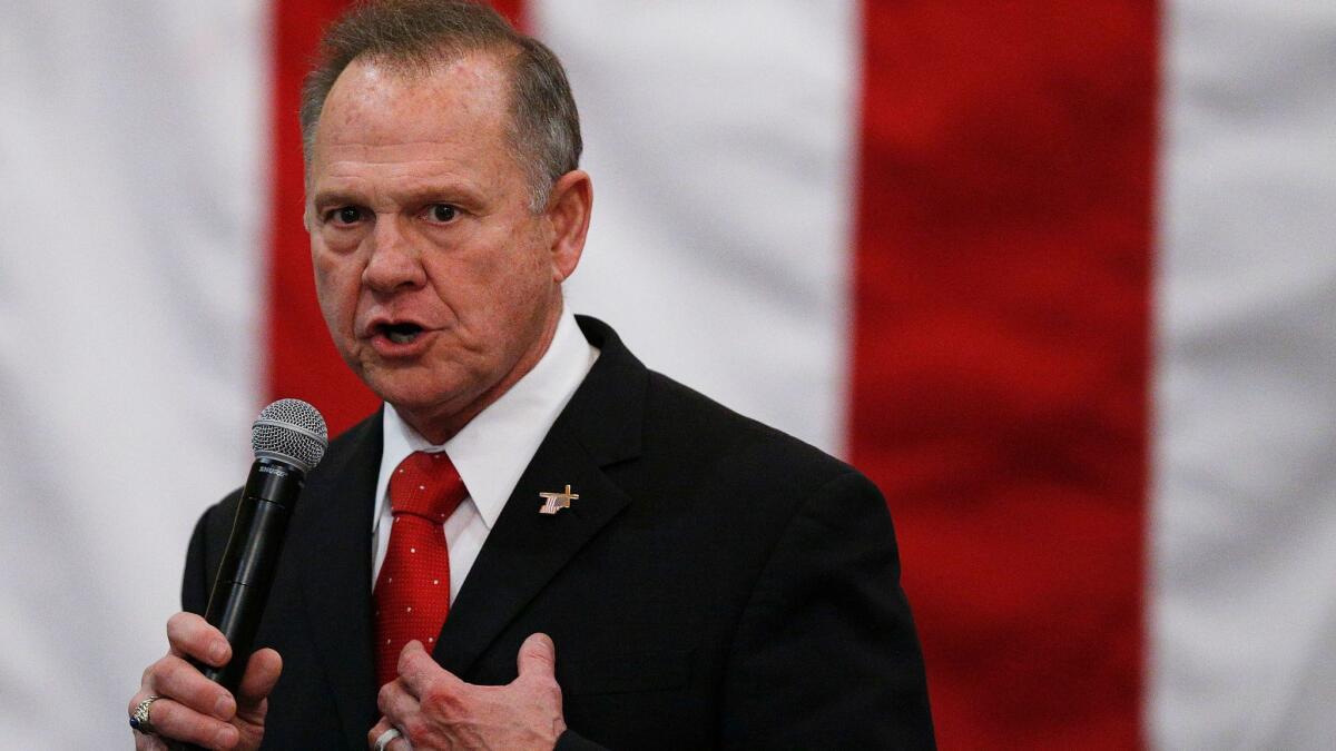 U.S. Senate candidate Roy Moore speaks at a campaign rally in Midland City, Ala., earlier this year.