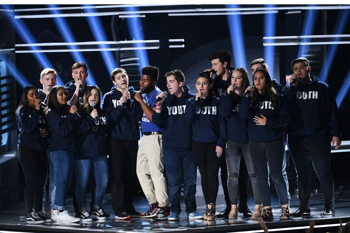 Members of the choir from Marjory Stoneman Douglas High School in Parkland, Fla., join Khalid and Shawn Mendes for the end of "Youth" as a plea to end gun violence. Fourteen people were shot to death at the Florida high school in February, and two days before the Billboard awards, 10 were killed in a Texas high school shooting.