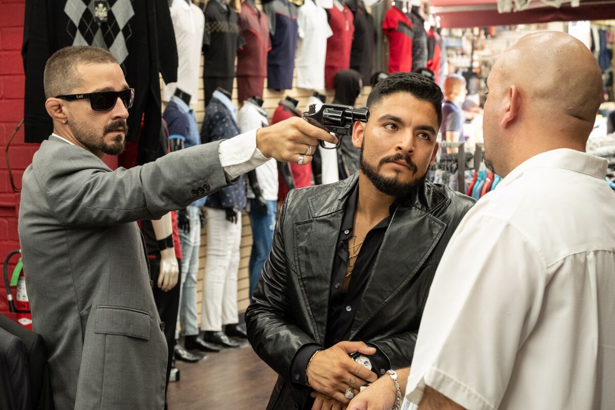 Shia LaBeouf, left, and Bobby Soto star in the Mexican American crime drama "The Tax Collector," directed by David Ayer.