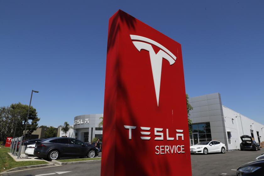 COSTA MESA, CALIF. -- TUESDAY, JULY 24, 2018: Exterior view of the Tesla Service facility in Costa Mesa, Calif., on July 24, 2018.Good news: Your Tesla Model 3 is finally ready. Bad news: It may take weeks to get it serviced. As Tesla ramps up its Fremont, Calif., factory to escape what Elon Musk called â€œproduction hellâ€ with its new Model 3 electric sedan, some customers are enduring their own state of suffering trying to get Teslas serviced. Parts shortages, long repair delays and problems getting through on customer help lines have led to scenes of strife at Teslaâ€™s service centers. (Allen J. Schaben / Los Angeles Times)