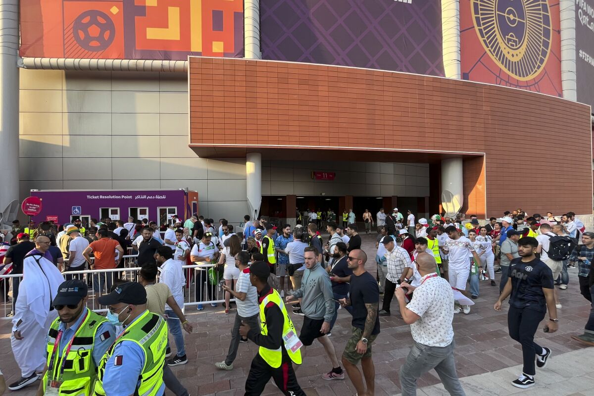 Fans arrive for the World Cup group B soccer match between England and Iran at the Khalifa International Stadium Doha, Qatar