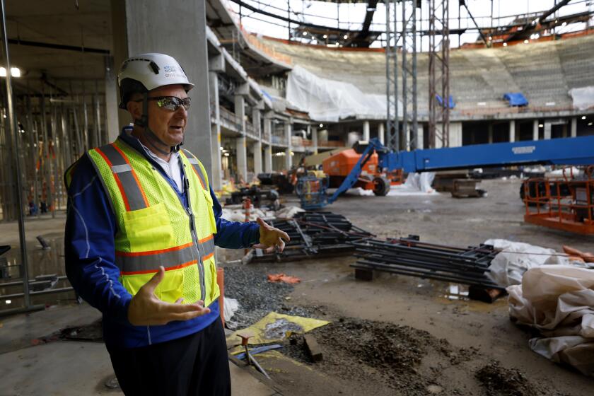 Inglewood, CA - January 10: Los Angeles Clippers owner Steve Ballmer tours the Intuit Dome, the team's new arena under construction on Tuesday, January 9, 2023 in Inglewood, CA. At right is a feature where the stands run from the floor to the top, inspired by a trip to Viejas Arena. (K.C. Alfred / The San Diego Union-Tribune)