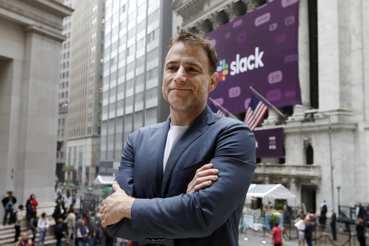 Slack Chief Executive Stewart Butterfield stands outside the New York Stock Exchange before his company's 2019 IPO.