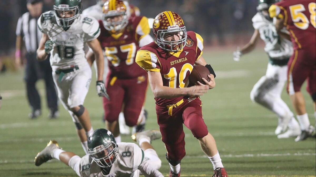 Trevor Pacheco (10) rushed for 1,534 yards and 19 touchdowns for Estancia High in the 2018 football season.