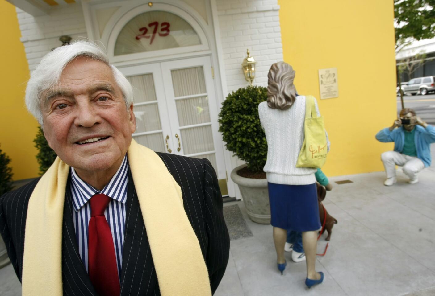 Fred Hayman stands alongside the Giorgio Beverly Hills storefront he has re-created. For nearly four decades the boutique -- in one incarnation or another -- has sold designer clothes to Hollywood A-listers, Beverly Hills mavens and Arab sheiks. Hayman is credited with turning Rodeo Drive into a world-class shopping mecca.