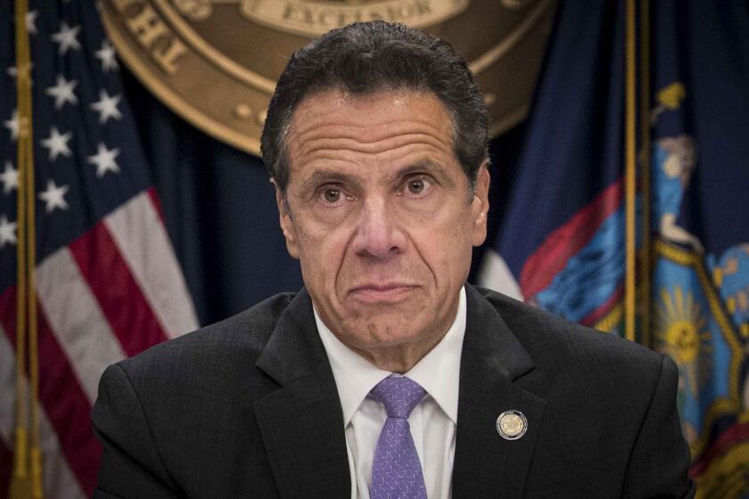 FILE - In this Sept. 14, 2018 file photo, Gov. Andrew Cuomo listens during a news conference in New York. Gov. Andrew Cuomo is expected to be interviewed by investigators with the state attorney general’s office who are looking into sexual harassment allegations as the probe nears its conclusion. The timing of the interview Saturday, July 17, 2021 in Albany was confirmed by two people familiar with the case who spoke to The Associated Press on condition of anonymity. (AP Photo/Mary Altaffer, File)