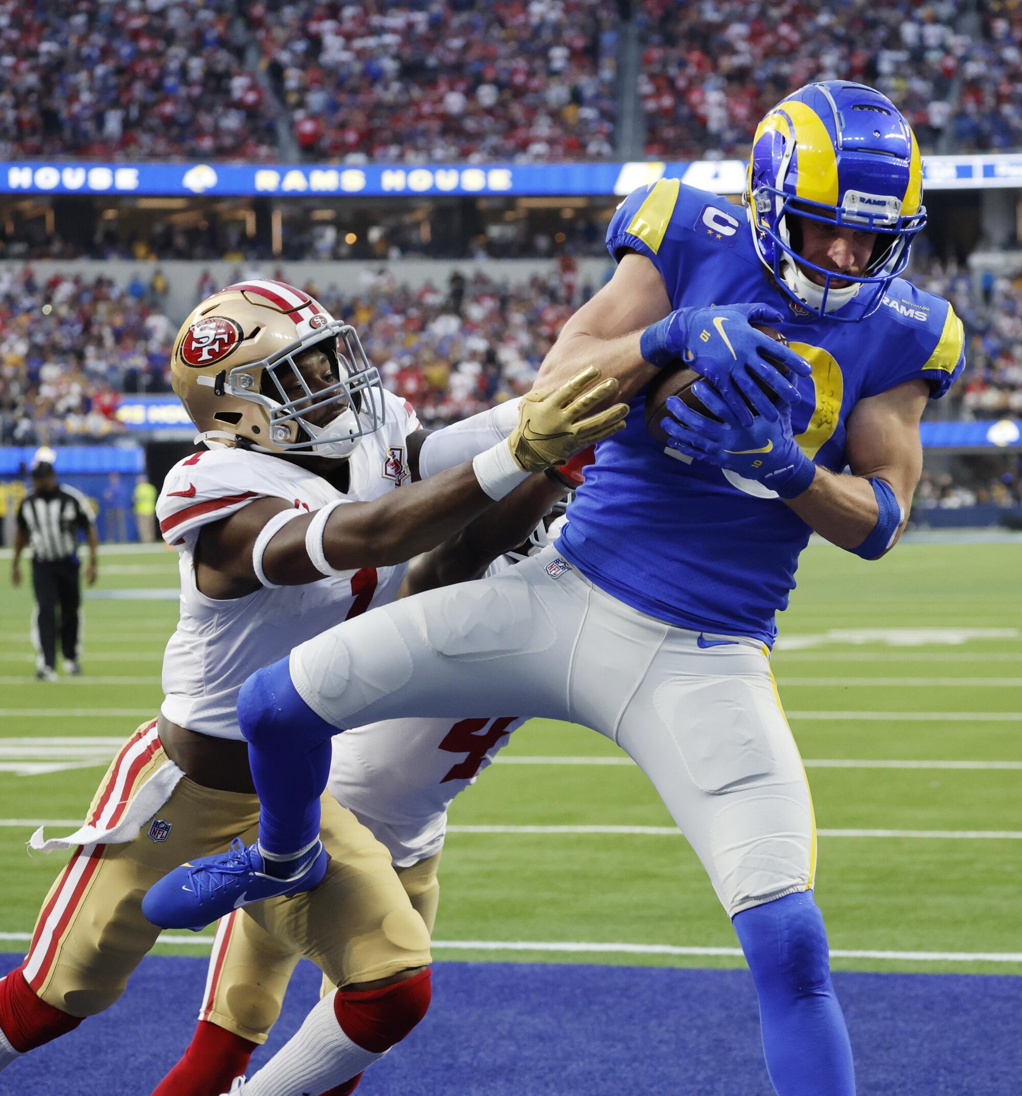 Rams wide receiver Cooper Kupp (10) catches a touchdown pass against 49ers free safety Jimmie Ward