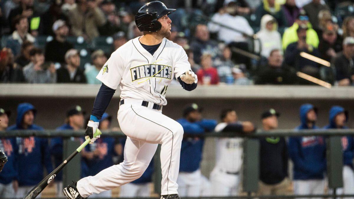 Tim Tebow of the Class-A Columbia Fireflies hits a home run in his first at-bat on opening day.