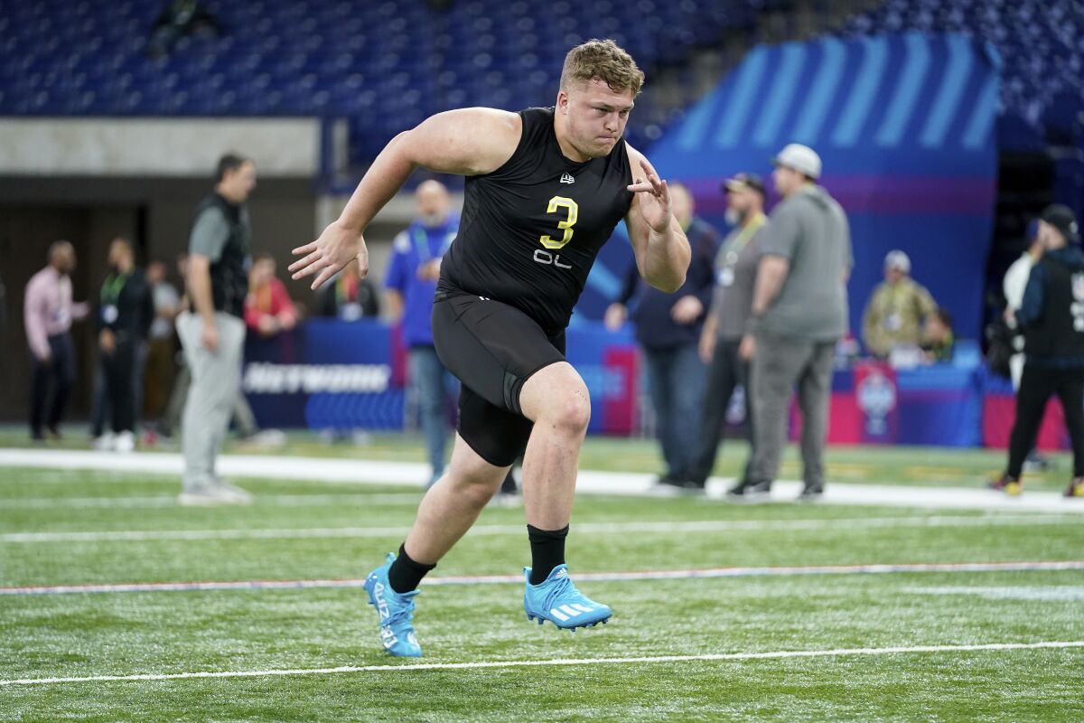 Wisconsin offensive lineman Logan Bruss warms up at the NFL scouting combine in March.