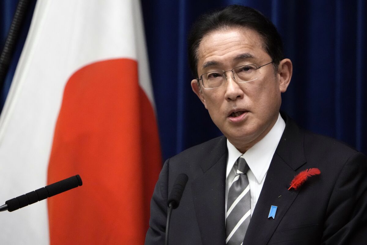 FILE- Japanese Prime Minister Fumio Kishida speaks during a news conference at the prime minister's official residence, Oct. 14, 2021, in Tokyo. Kishida is arriving in India on Saturday and his meeting with Prime Minister Narendra Modi is expected to bolster ties to tackle China’s growing footprint in the Indo-Pacific area. (AP Photo/Eugene Hoshiko, File)