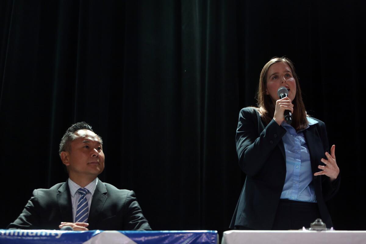 Council candidate Loraine Lundquist, right, and her opponent, now-Councilman John Lee, during a forum in July in Los Angeles.