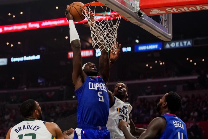 LOS ANGELES, CALIF. - NOVEMBER 03: LA Clippers forward Montrezl Harrell (5) goes for a layup against the Utah Jazz during a NBA game at Staples Center on Sunday, Nov. 3, 2019 in Los Angeles, Calif. (Kent Nishimura / Los Angeles Times)