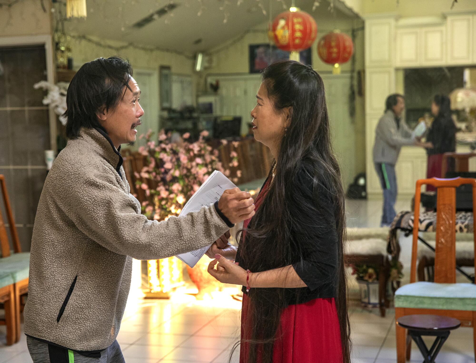 Two people rehearse a scene