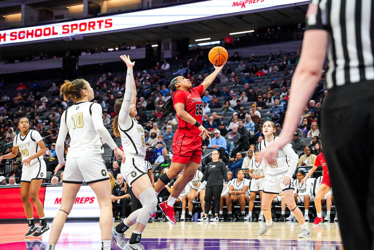Aliyahna Morris of Etiwanda elevates for a left-handed layup against Archbishop Mitty in the Open Division state title game.