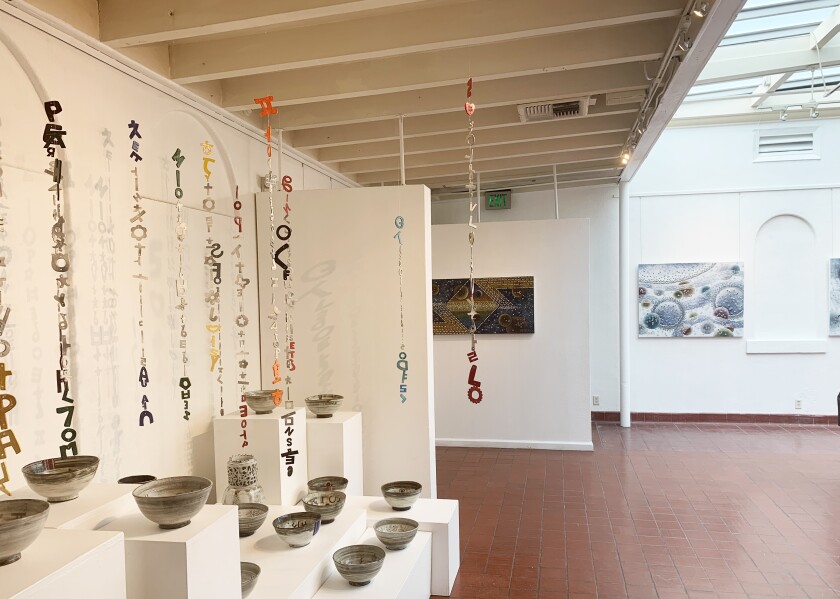 "Rhythm of Language" and "Fellowship of Language" installation by ceramicist Young Shin Kim.