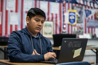 Los Angeles, CA - April 04: After losing three days of instruction from the LAUSD strike, 7th-grader Dylan Camacho, 13, 7th studies in 7th/8th grade English and Social Studies class as he joins fellow students participating in "acceleration days," which are intended as an opportunity for needed but optional extended learning for all students in the nation's second-largest school system at Griffith STEAM Magnet Middle School in Los Angeles Tuesday, April 4, 2023. (Allen J. Schaben / Los Angeles Times)