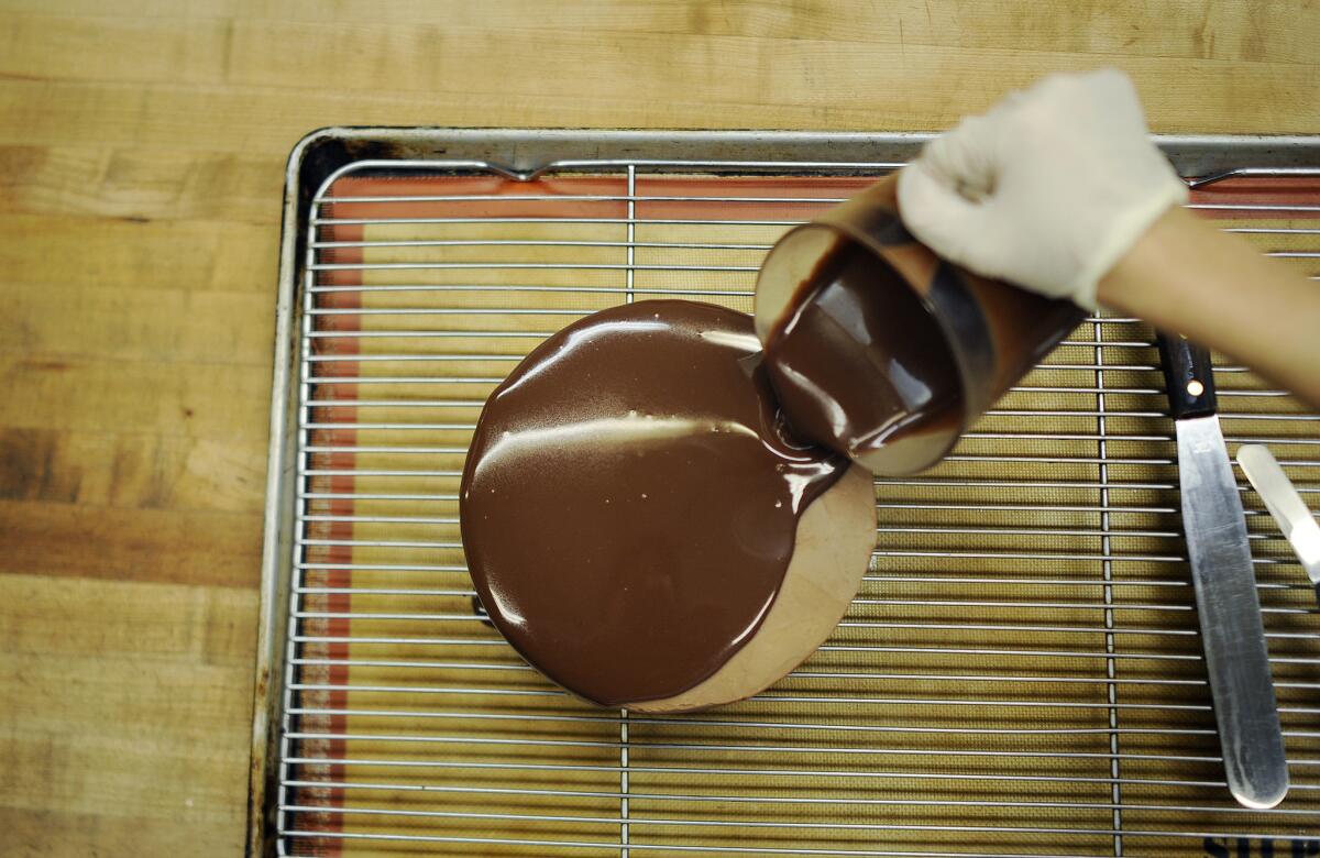 The cake is topped with bittersweet chocolate glaze.