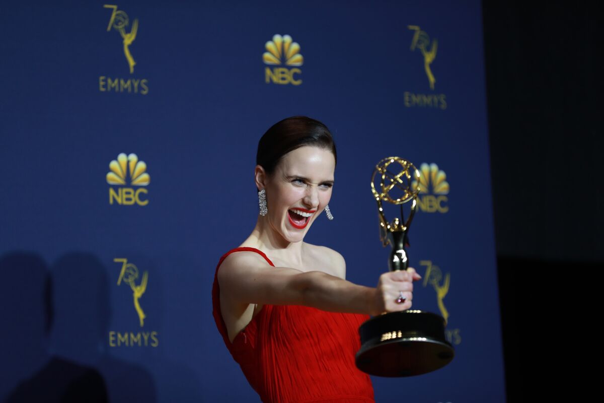 "The Marvelous Mrs. Maisel" star Rachel Brosnahan with her award for lead actress in a comedy backstage at the Emmys