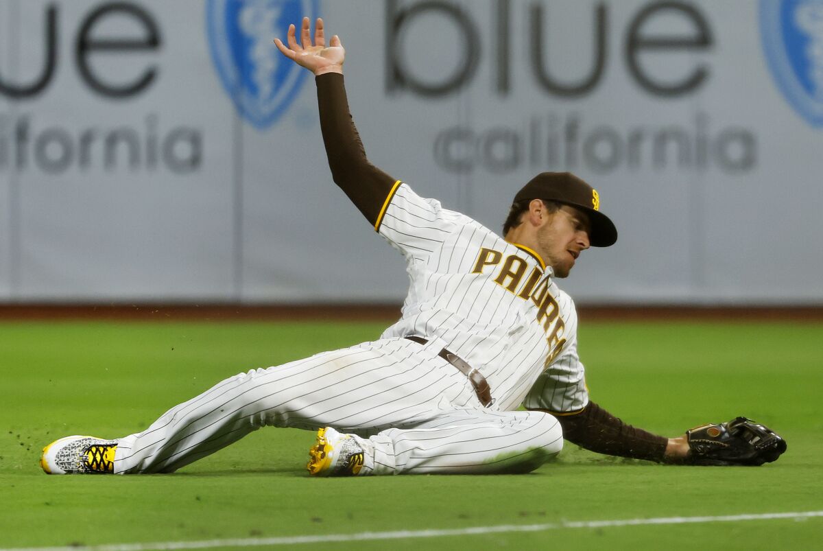 Padres right fielder Wil Myers catches a fly ball hit by the Reds' Alejo Lopez 