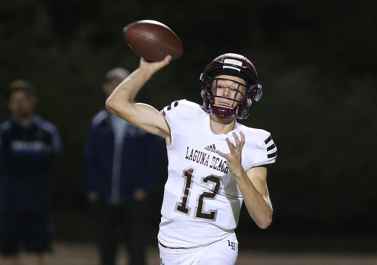 Laguna Beach's Andrew Johnson, shown completing a pass against Northwood at Irvine High on Nov. 9, 2018, leads the Breakers in Thursday's season opener in Maryland.