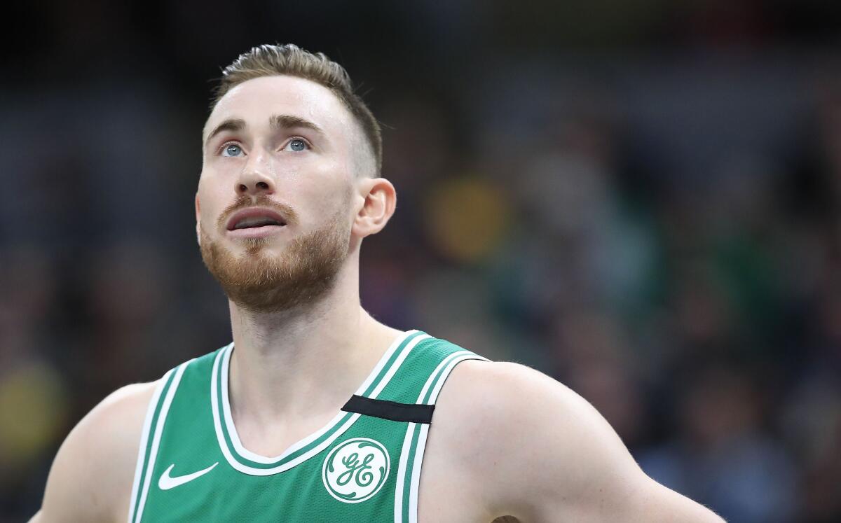 Boston Celtics' Gordon Hayward checks the scoreboard during a game against the Indiana Pacers on March 10, 2020, in Indianapolis.