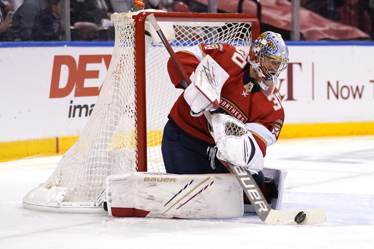 FILE - In this Monday, May 24, 2021, file photo, Florida Panthers goaltender Spencer Knight (30) stops a shot on the goal during the first period in Game 5 of an NHL hockey Stanley Cup first-round playoff series against the Tampa Bay Lightning, in Sunrise, Fla. Knight was a rising star for the Panthers last season and is preparing for his first full season at the NHL level. (AP Photo/Lynne Sladky, File)