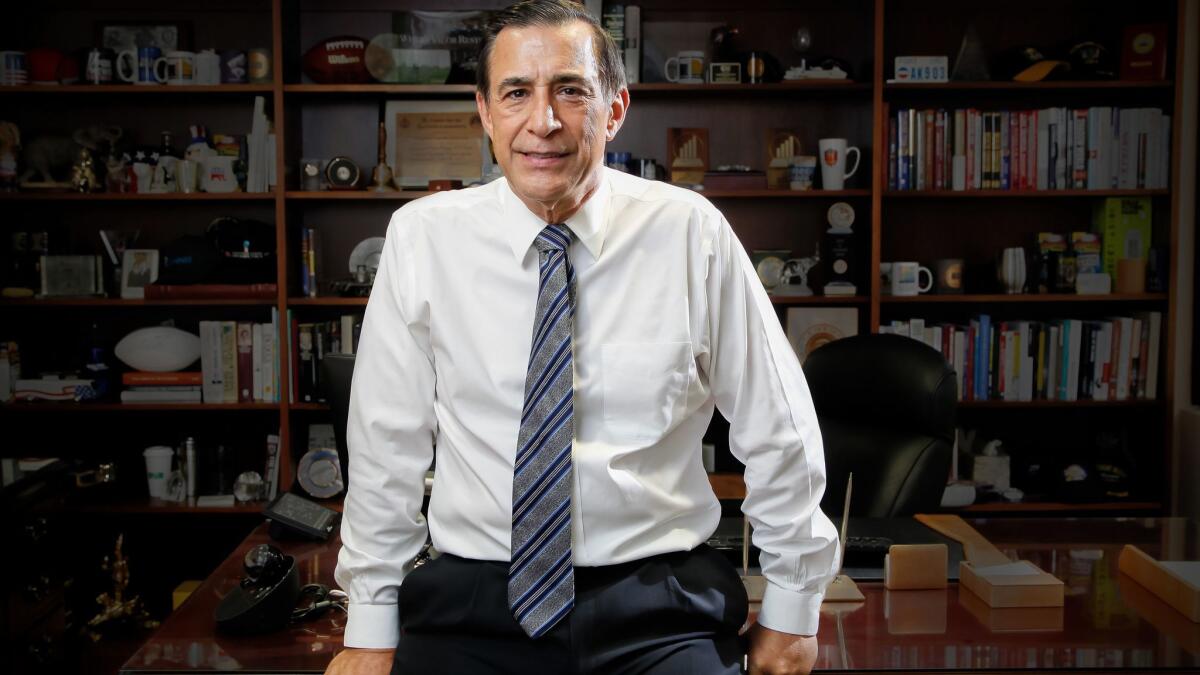Republican Rep. Darrell Issa poses at his district office in Vista.