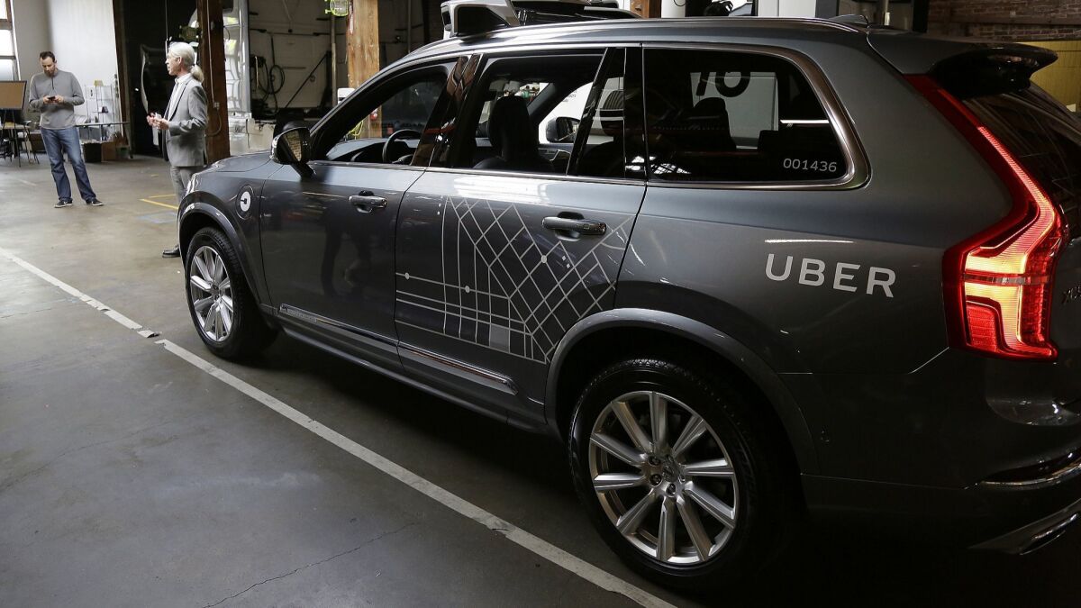 An Uber driverless car is parked in a garage in San Francisco in 2016.