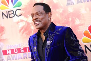Charlie Wilson arrives at the iHeartRadio Music Awards at The Shrine Auditorium on Sunday, March 29, 2015, in Los Angeles. (Photo by John Salangsang/Invision/AP)