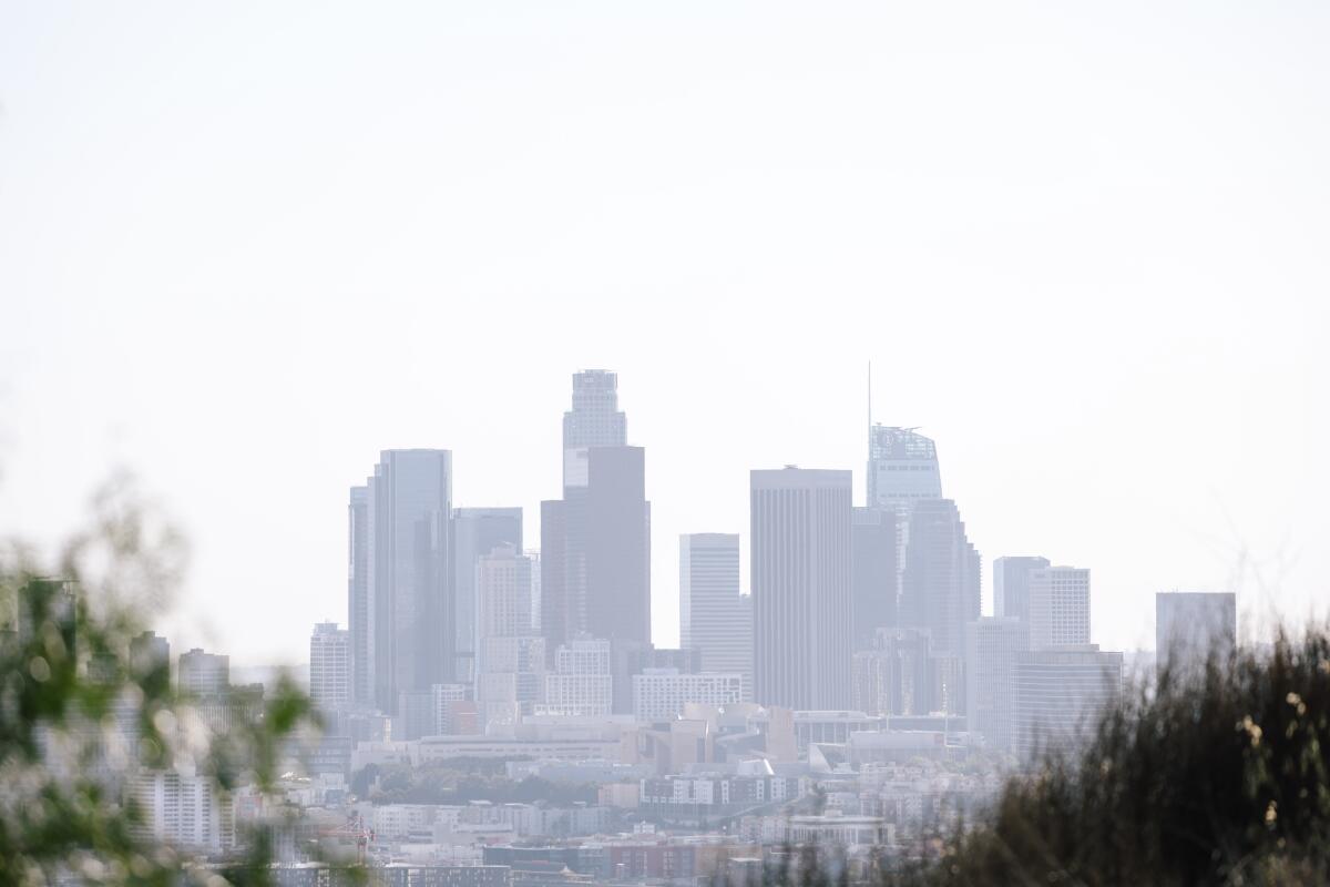A smoggy view of downtown Los Angeles from Montecito Heights in April 2023.