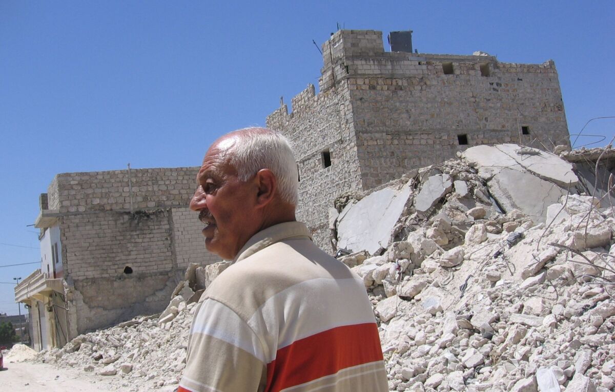 A Scud missile struck near Abdulaziz Haizaan's home in Aleppo, crumbling much of the top floor, blowing out doors and shattering glass. But a week later, the retired factory worker borrowed about $1,150 and began to rebuild.